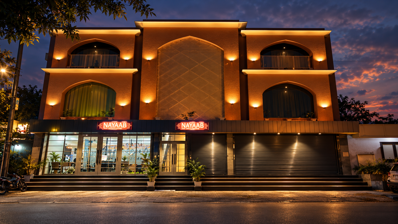 Hotel Nayaab grand illuminated exterior at dusk
