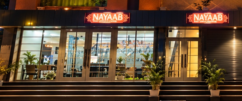 Hotel Nayaab front glass reception and lobby entrance
